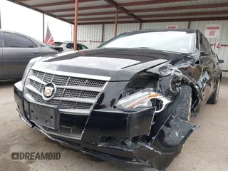 2010 Cadillac CTS with VIN 1G6DA5EGXA0138568, listed as a IAAI auction lot 41354741 with 173,253 mi miles and . Bid and sale history available at DreamBid. Image 6.
