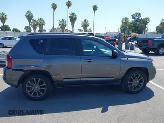 2016 Jeep Compass Sport SE z VIN 1C4NJDBBXGD729747, wystawiony jako IAAI lot #42642509 z przebiegiem 157 774 mil mil oraz . Historia ofert i sprzedaży dostępna na DreamBid. Obrazek 13.