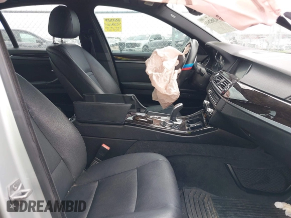 2014 BMW 5 Series 535i z VIN WBA5B1C5XED917358, wystawiony jako IAAI lot #42082611 z przebiegiem 129 199 mil mil oraz . Historia ofert i sprzedaży dostępna na DreamBid. Obrazek 5.
