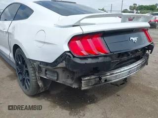 2019 Ford Mustang EcoBoost with VIN 1FA6P8THXK5143703, listed as a IAAI auction lot 42056207 with 71,251 mi miles and . Bid and sale history available at carsss.com. Image 21.