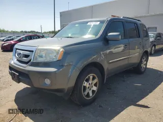 2009 Honda Pilot Touring z VIN 5FNYF48889B020725, wystawiony jako Copart lot #59291385 z przebiegiem 214 712 mil mil oraz Szkoda całkowita • Salvage title. Historia ofert i sprzedaży dostępna na DreamBid. Obrazek 1.