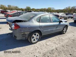 2000 Ford Taurus SE with VIN 1FAFP53U3YG259124, listed as a Copart auction lot 77363344 with 154,889 mi miles and Salvage Title. Bid and sale history available at DreamBid. Image 3.