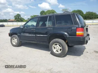 1998 Jeep Grand Cherokee Laredo with VIN 1J4GZ48S7WC222845, listed as a Copart auction lot 59576115 with Not provided miles and Clean title. Bid and sale history available at DreamBid. Image 2.