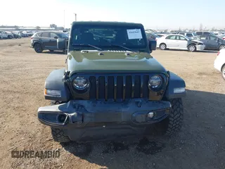 2021 Jeep Wrangler Sport S with VIN 1C4HJXAG0MW552427, listed as a IAAI auction lot 41643643 with 53,013 mi miles and . Bid and sale history available at DreamBid. Image 12.
