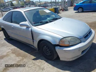 1996 Honda Civic EX with VIN 1HGEJ8241TL022546, listed as a IAAI auction lot 42036699 with 156,980 mi miles. Bid and sale history available at carsss.com. Image 1.