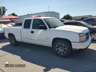 2006 Chevrolet Silverado 1500 LT1 with VIN 1GCEC19T16Z137825, listed as a Copart auction lot 70054844 with 64,477 mi miles and Salvage Title. Bid and sale history available at DreamBid. Image 4.