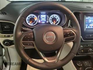 2021 Jeep Cherokee Altitude with VIN 1C4PJMLB9MD211826, listed as a IAAI auction lot 42666661 with 47,838 mi miles and . Bid and sale history available at DreamBid. Image 13.