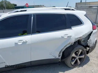 2019 Jeep Cherokee Limited with VIN 1C4PJLDB8KD402904, listed as a IAAI auction lot 42107306 with 96,677 mi miles and . Bid and sale history available at DreamBid. Image 6.