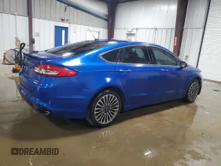 2018 Ford Fusion Titanium с VIN 3FA6P0D90JR159218, выставлен на аукционе Copart как лот 63766945 с пробегом 115 529 миль миль и Списание • Salvage title. История ставок и продаж доступна на DreamBid. Изображение 3.