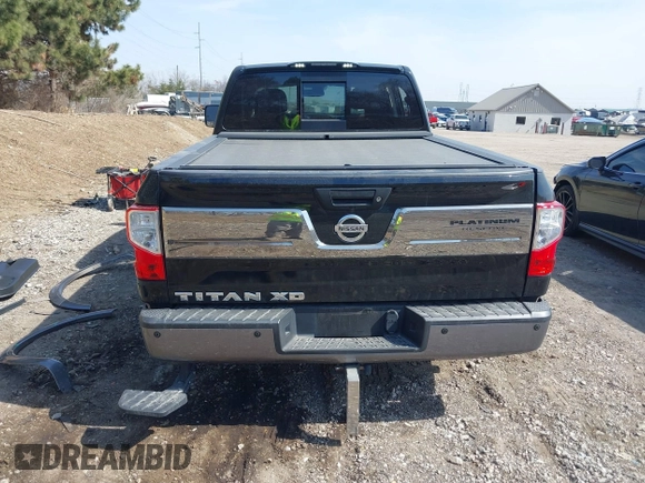 2016 Nissan Titan XD Platinum Reserve with VIN 1N6BA1F27GN506410, listed as a IAAI auction lot 41768621 with 159,404 mi miles. Bid and sale history available at carsss.com. Image 17.