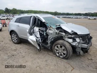 2015 Cadillac SRX Luxury Collection z VIN 3GYFNEE31FS618855, wystawiony jako Copart lot #54868505 z przebiegiem 111 612 mil mil oraz Szkoda całkowita • Salvage title. Historia ofert i sprzedaży dostępna na DreamBid. Obrazek 4.