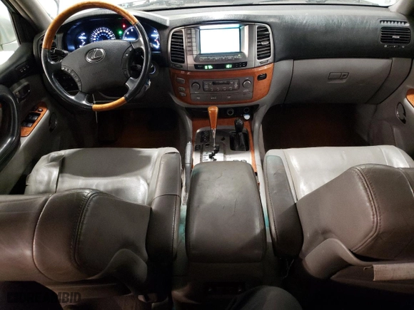 2004 Lexus LX 470 with VIN JTJHT00W843548361, listed as a Copart auction lot 76465204 with 257,543 mi miles and Salvage Title. Bid and sale history available at carsss.com. Image 8.