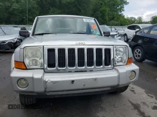 2009 Jeep Commander Sport z VIN 1J8HG48K29C531877, wystawiony jako Copart lot #58708825 z przebiegiem 198 585 mil mil oraz Szkoda całkowita • Salvage title. Historia ofert i sprzedaży dostępna na DreamBid. Obrazek 5.