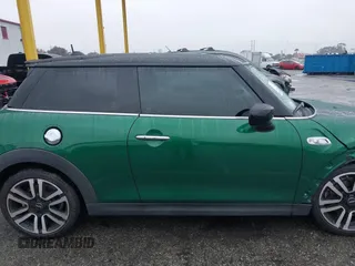2020 MINI Hardtop Cooper S z VIN WMWXR5C08L2L85651, wystawiony jako IAAI lot #41521346 z przebiegiem 40 863 mil mil oraz . Historia ofert i sprzedaży dostępna na DreamBid. Obrazek 14.