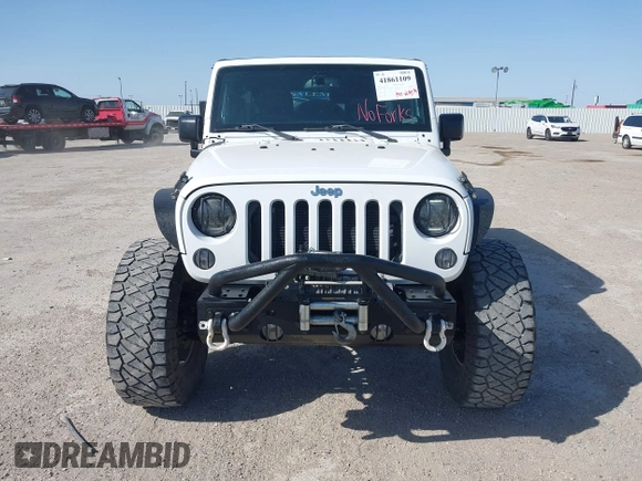 2014 Jeep Wrangler Unlimited Rubicon with VIN 1C4BJWFG1EL167423, listed as a IAAI auction lot 41861109 with 104,669 mi miles. Bid and sale history available at carsss.com. Image 6.