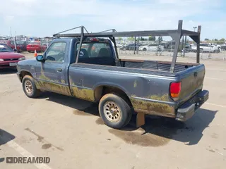1994 Mazda B-Series 2WD Truck SE with VIN 4F4CR12U0RTM15167, listed as a IAAI auction lot 42033438 with 180,699 mi miles. Bid and sale history available at carsss.com. Image 3.