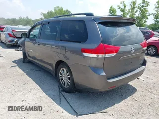 2012 Toyota Sienna XLE AAS with VIN 5TDYK3DCXCS202574, listed as a IAAI auction lot 42714762 with 234,287 mi miles and . Bid and sale history available at DreamBid. Image 3.