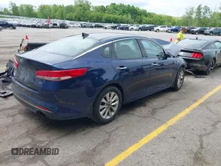 2016 Kia Optima EX with VIN 5XXGU4L30GG013940, listed as a IAAI auction lot 42371297 with Not provided miles and . Bid and sale history available at DreamBid. Image 4.