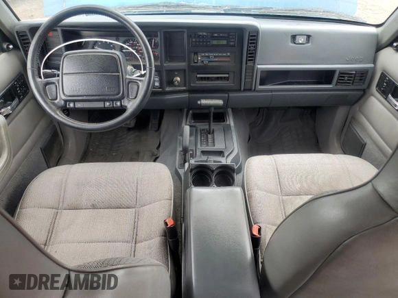 1996 Jeep Cherokee Sport with VIN 1J4FJ68S3TL251074, listed as a Copart auction lot 59593955 with 181,482 mi miles and Salvage title. Bid and sale history available at DreamBid. Image 8.