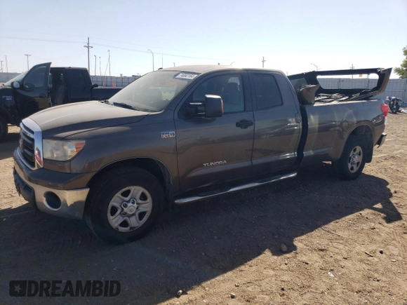 2010 Toyota Tundra 4WD Truck with VIN 5TFCY5F18AX009492, listed as a Copart auction lot 74092164 with 210,981 mi miles and Clean Title. Bid and sale history available at carsss.com. Image 1.