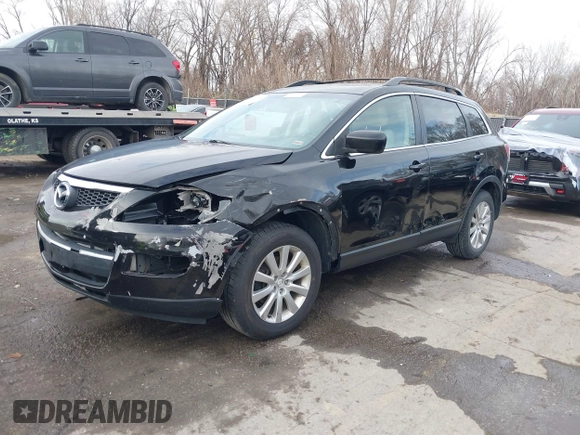 2008 Mazda CX-9 Sport with VIN JM3TB28A480129636, listed as a IAAI auction lot 41111025 with 223,075 mi miles and . Bid and sale history available at DreamBid. Image 2.