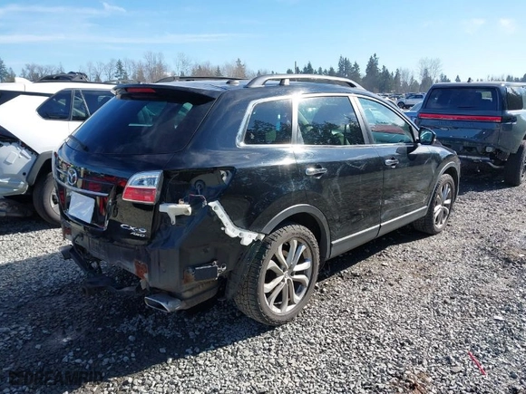 2012 Mazda CX-9 Grand Touring with VIN JM3TB3DV9C0360510, listed as a IAAI auction lot 41697980 with 160,578 mi miles. Bid and sale history available at carsss.com. Image 4.