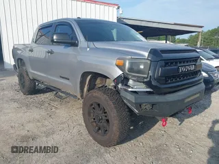 2014 Toyota Tundra SR5 with VIN 5TFEM5F15EX077209, listed as a IAAI auction lot 42500939 with 173,280 mi miles and . Bid and sale history available at DreamBid. Image 1.