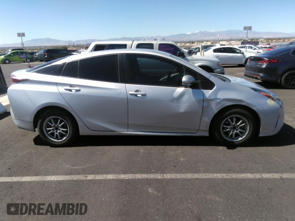 2017 Toyota Prius Two z VIN JTDKBRFU1H3551324, wystawiony jako IAAI lot #41893385 z przebiegiem 305 445 mil mil oraz . Historia ofert i sprzedaży dostępna na DreamBid. Obrazek 13.