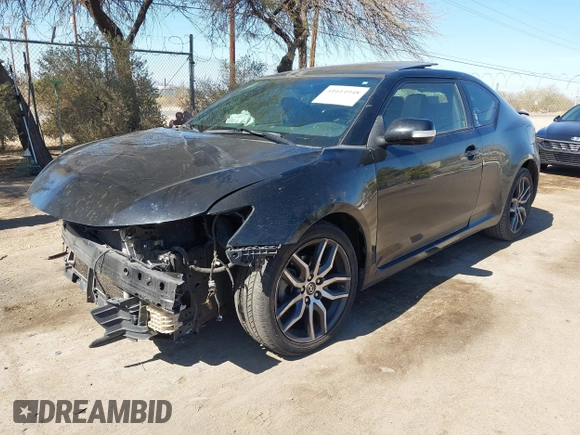 2016 Scion tC z VIN JTKJF5C7XGJ017894, wystawiony jako IAAI lot #41614948 z przebiegiem 109 311 mil mil oraz . Historia ofert i sprzedaży dostępna na DreamBid. Obrazek 2.