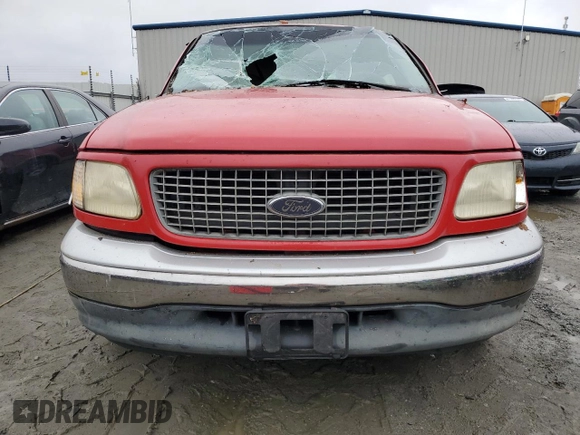 1999 Ford F-150 with VIN 1FTRX17W3XNA26575, listed as a Copart auction lot 81508484 with 138,704 mi miles and Salvage title. Bid and sale history available at DreamBid. Image 5.