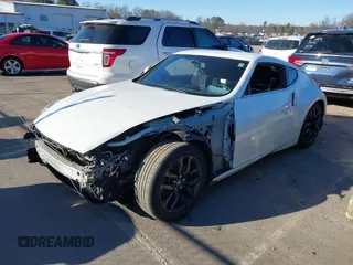 2017 Nissan 370Z with VIN JN1AZ4EHXHM954875, listed as a IAAI auction lot 41641554 with 101,093 mi miles. Bid and sale history available at carsss.com. Image 2.