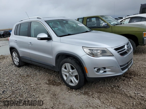 2011 Volkswagen Tiguan SE with VIN WVGBV7AX1BW546543, listed as a Copart auction lot 48498065 with 129,728 mi miles and Clean Title. Bid and sale history available at DreamBid. Image 4.