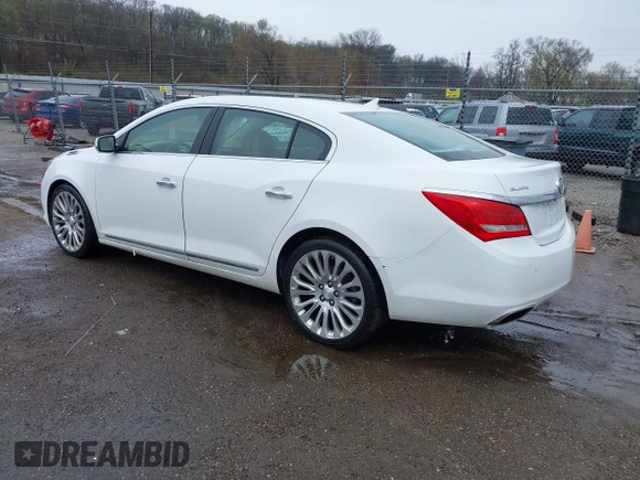 2014 Buick LaCrosse Premium II with VIN 1G4GF5G39EF305460, listed as a IAAI auction lot 41951229 with 127,188 mi miles and . Bid and sale history available at DreamBid. Image 3.