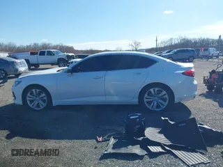 2021 Acura TLX Technology z VIN 19UUB6F41MA006805, wystawiony jako IAAI lot #41869747 z przebiegiem 59 228 mil mil oraz . Historia ofert i sprzedaży dostępna na DreamBid. Obrazek 15.
