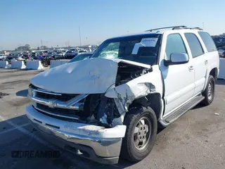 2002 Chevrolet Tahoe LS z VIN 1GNEC13TX2R240719, wystawiony jako IAAI lot #41616356 z przebiegiem 235 081 mil mil oraz . Historia ofert i sprzedaży dostępna na DreamBid. Obrazek 2.
