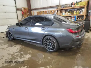 2022 BMW 3 Series M340i xDrive with VIN WBA5U9C02NFL66019, listed as a Copart auction lot 86330044 with 42,394 mi miles and Salvage Title. Bid and sale history available at DreamBid. Image 2.