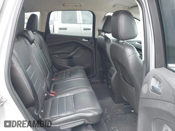 2013 Ford Escape SEL with VIN 1FMCU9H93DUD70670, listed as a IAAI auction lot 41867784 with 207,956 mi miles. Bid and sale history available at carsss.com. Image 8.