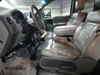 2007 Ford F-150 XL with VIN 1FTVX14527NA78614, listed as a Copart auction lot 45945555 with 297,404 mi miles and Salvage Title. Bid and sale history available at carsss.com. Image 7.