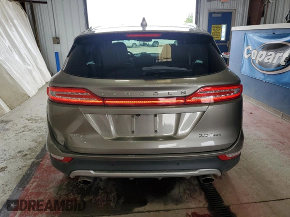 2017 Lincoln MKC Select z VIN 5LMCJ2D93HUL34678, wystawiony jako Copart lot #55308415 z przebiegiem 60 242 mil mil oraz Szkoda całkowita • Salvage title. Historia ofert i sprzedaży dostępna na DreamBid. Obrazek 6.