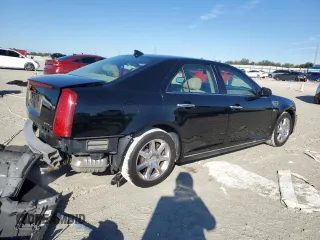 2009 Cadillac STS AWD z VIN 1G6DD67V690120833, wystawiony jako Copart lot #42502345 z przebiegiem 100 250 mil mil oraz Szkoda całkowita • Salvage title. Historia ofert i sprzedaży dostępna na DreamBid. Obrazek 3.