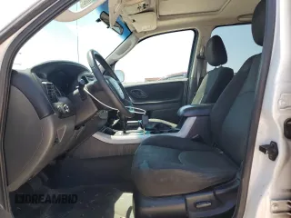 2006 Mazda Tribute S with VIN 4F2YZ04166KM12531, listed as a Copart auction lot 63354374 with 196,753 mi miles and Salvage Title. Bid and sale history available at carsss.com. Image 7.