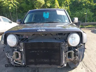2014 Jeep Patriot Sport with VIN 1C4NJPBA0ED690284, listed as a IAAI auction lot 42513472 with 148,979 mi miles and . Bid and sale history available at DreamBid. Image 6.