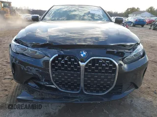 2022 BMW 4 Series 430i xDrive with VIN WBA73AP07NCJ63605, listed as a IAAI auction lot 41685409 with 40,254 mi miles and . Bid and sale history available at carsss.com. Image 6.