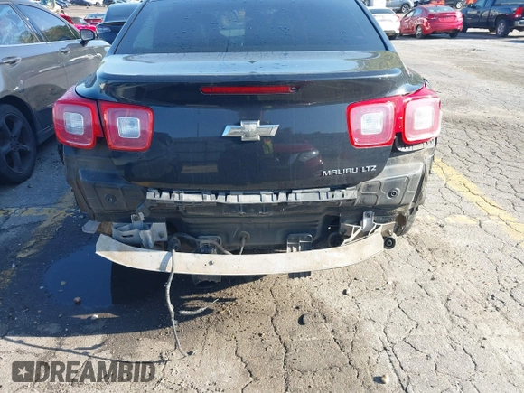 2014 Chevrolet Malibu LTZ with VIN 1G11H5SL9EF123813, listed as a IAAI auction lot 41984575 with 204,536 mi miles and . Bid and sale history available at DreamBid. Image 6.