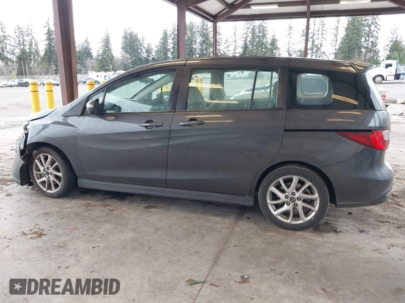 2014 Mazda 5 Touring with VIN JM1CW2CL7E0167945, listed as a IAAI auction lot 41624435 with 167,736 mi miles. Bid and sale history available at carsss.com. Image 14.
