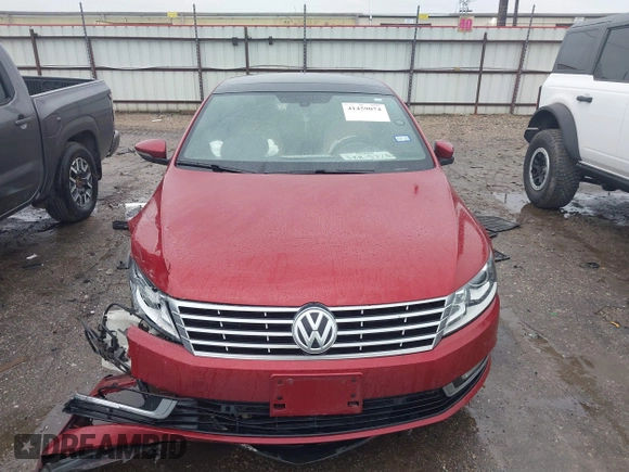 2013 Volkswagen CC VR6 Executive 4Motion with VIN WVWGU7AN9DE561506, listed as a IAAI auction lot 41459074 with 70,128 mi miles. Bid and sale history available at carsss.com. Image 11.