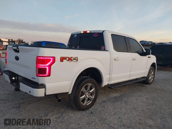 2018 Ford F-150 XL with VIN 1FTEW1EG4JKD64590, listed as a IAAI auction lot 41056678 with 115,792 mi miles. Bid and sale history available at carsss.com. Image 4.