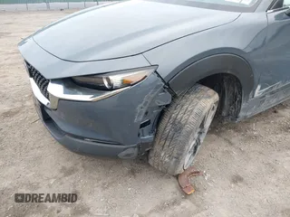 2024 Mazda CX-30 S Preferred with VIN 3MVDMBCM2RM618042, listed as a IAAI auction lot 41929064 with 15,106 mi miles and . Bid and sale history available at DreamBid. Image 6.