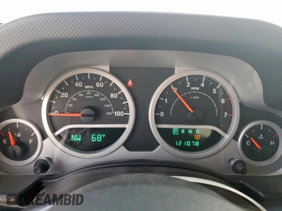 2009 Jeep Wrangler Sahara z VIN 1J4FA54169L780809, wystawiony jako Copart lot #50598925 z przebiegiem 121 078 mil mil oraz Szkoda całkowita • Salvage title. Historia ofert i sprzedaży dostępna na DreamBid. Obrazek 9.