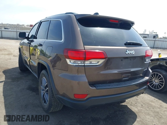 2020 Jeep Grand Cherokee Altitude with VIN 1C4RJEAG3LC220295, listed as a IAAI auction lot 42118183 with 104,097 mi miles and . Bid and sale history available at DreamBid. Image 3.